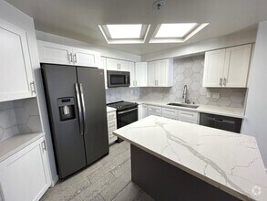 Building Photo - $1,000 OFF First Month's Rent! 2BR/2BA Dow...