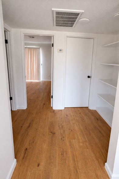 Bedrooms with hallway storage space - 321 W Orange Ave