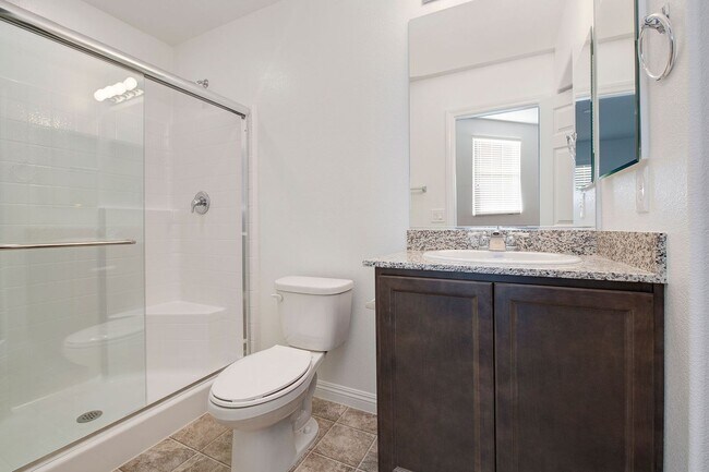 Building Photo - Newer Townhome - 3 Bedrooms + 2 Car Garage - E Craig & Nellis
