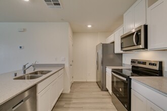 Building Photo - Gorgeous Townhome with upgrades in gated community* 3 large bedrooms, 2 car garage*Community pool...