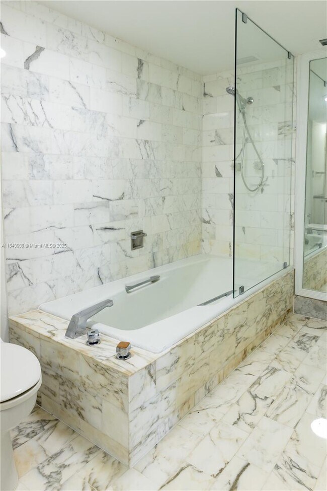 Building Photo - 6423 Collins Ave