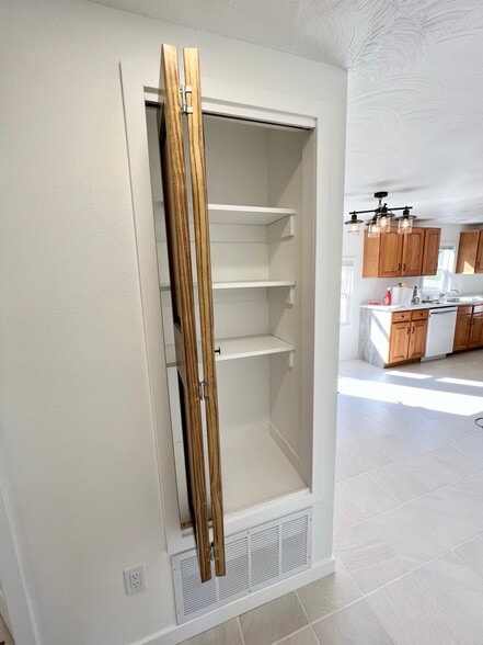 Linen closet - W4493 Spruce Dr