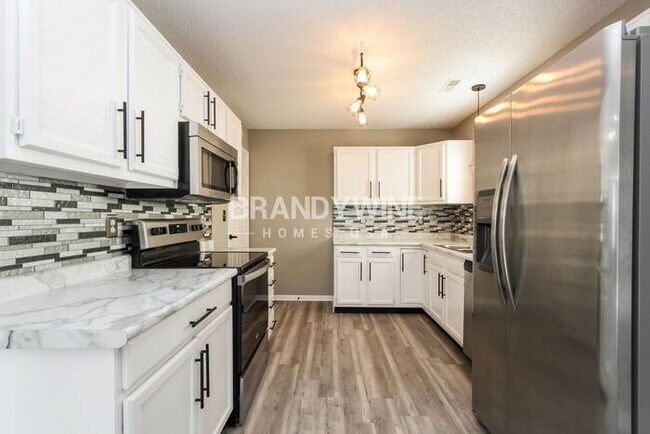 Building Photo - MOVE IN SPECIAL - February FREE with move ...