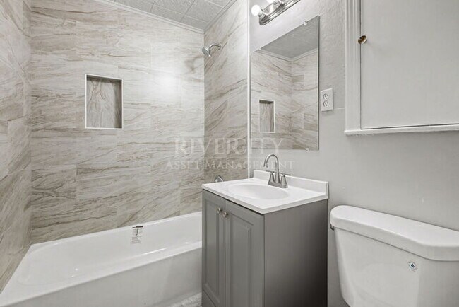 Building Photo - A MUST SEE LOCATED IN A BEAUTIFUL PART OF THE CITY!!!!!! SECTION 8 WELCOMED!!