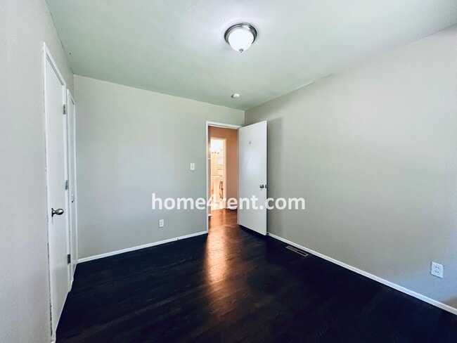 Building Photo - Attractive Prairie Village Ranch w/ FRESH PAINT, Wood Floors, Granite Counters and a Fenced Yard!