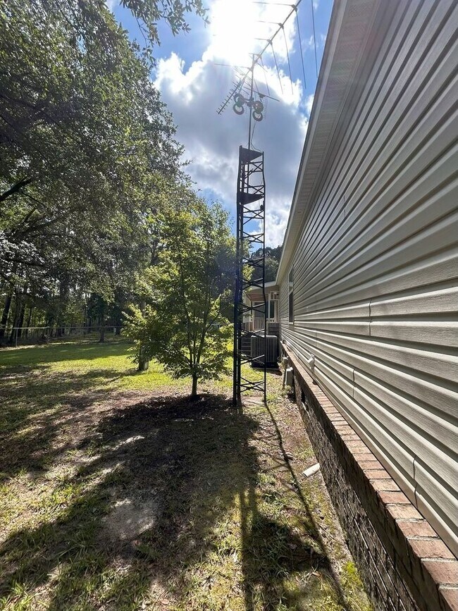Building Photo - Immaculate 4BR Mobile Home in the heart of...