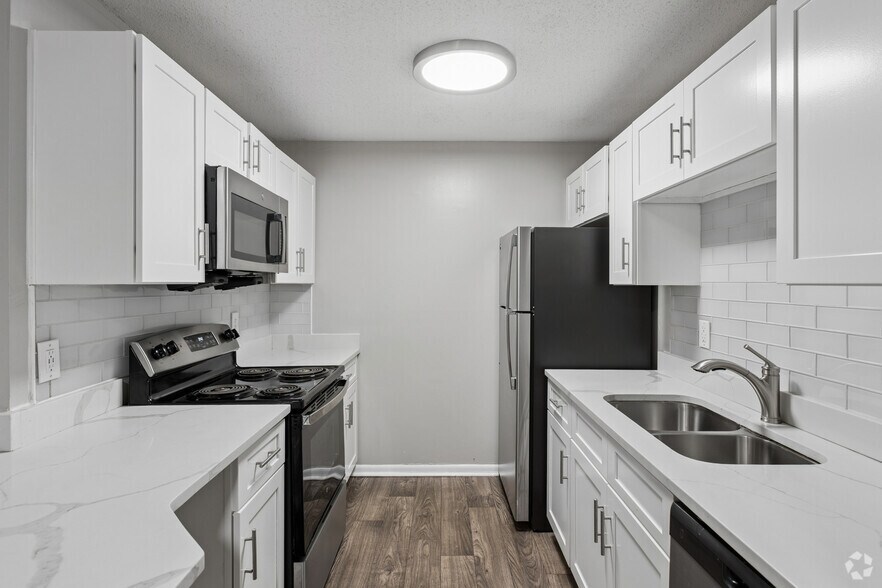 Sycamore 4BR, 2BA - 1,386SF - Kitchen - The Greens at Braelinn