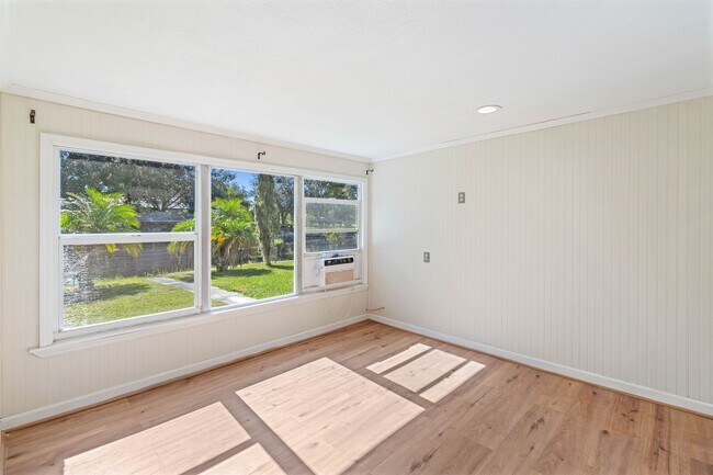 Building Photo - Charming 2BR/2BA Waterfront Home for Rent with Canal Access & Two Garages