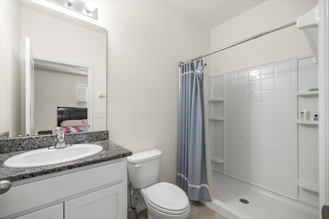 Building Photo - **Spacious 4-Bedroom, 3.5-Bath Home with Private Guest Suite and 3-Car Garage**