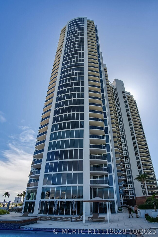 Building Photo - 18911 Collins Ave