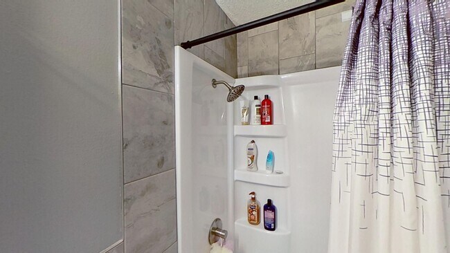 Building Photo - Updated two bedroom ranch duplex with partial basement finish, detached garage, close to mall/sho...