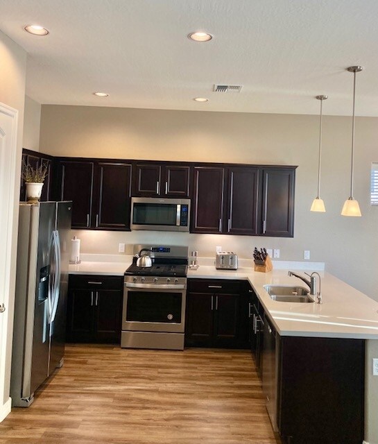 Kitchen view from LR - 5557 N Teaberry Ln