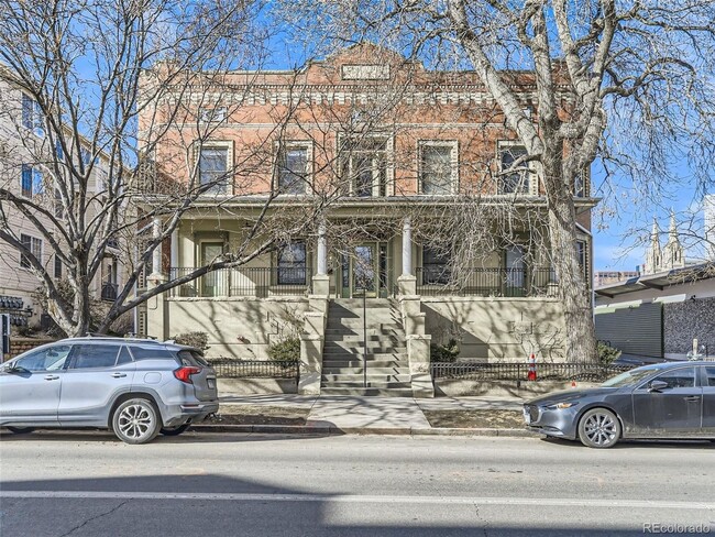 Building Photo - Large windows and exposed brick wall