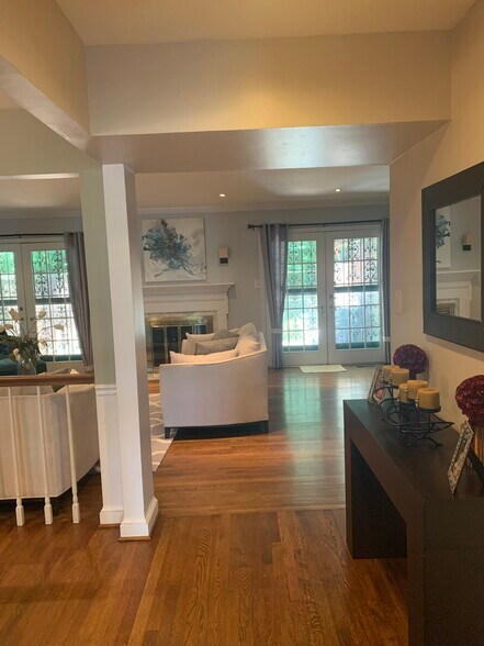 Entry into living room (second floor). - 2367 S Queen St