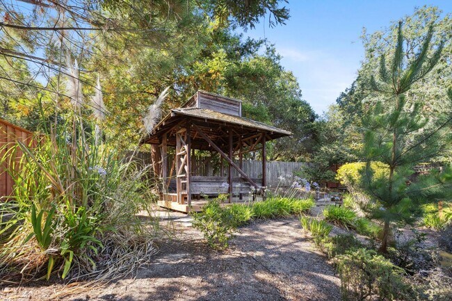 Building Photo - Elegant Two-Story Home with Backyard Oasis...