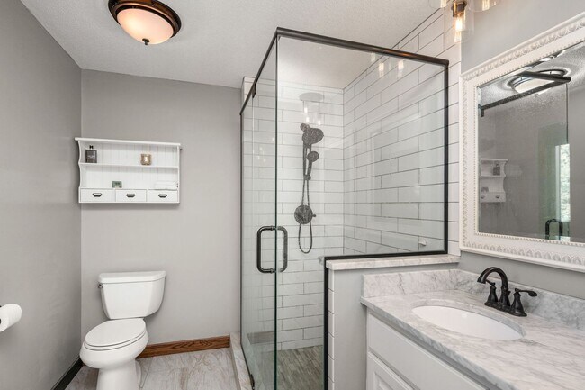 Building Photo - Stunning Remodeled 4BR Home w/ Pond View & 3-Seasons Porch!