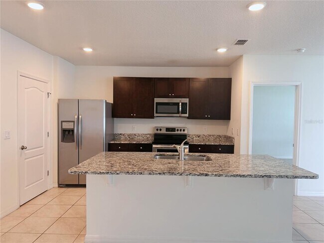 Building Photo - 1805 Rain Lily Pl