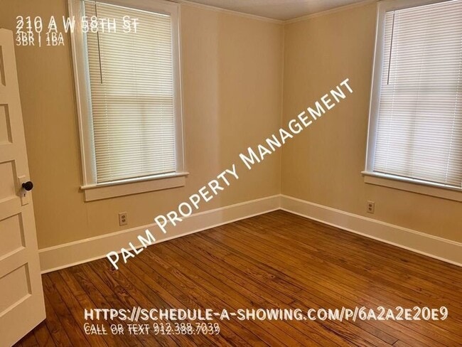 Building Photo - 210 W 58th St