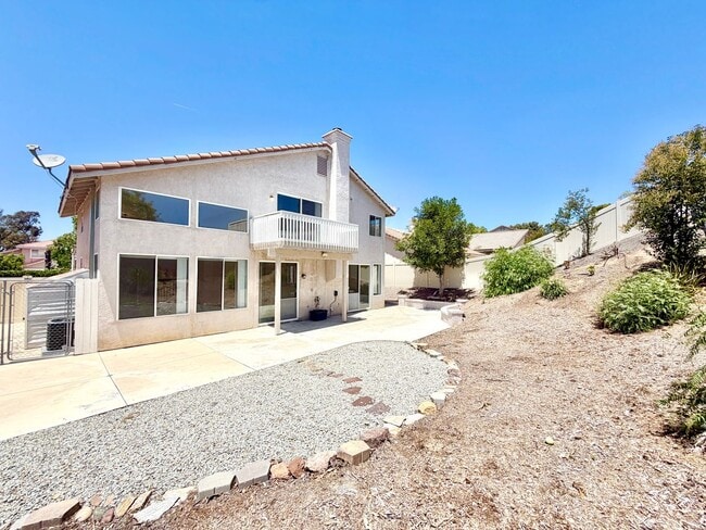 Building Photo - Spacious 5 Bedroom Home with 3 Car Garage & Primary Suite Balcony