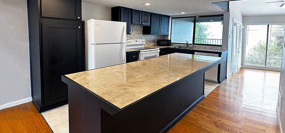 kitchen bar has plenty of space for stools - 6724 Eastridge Dr