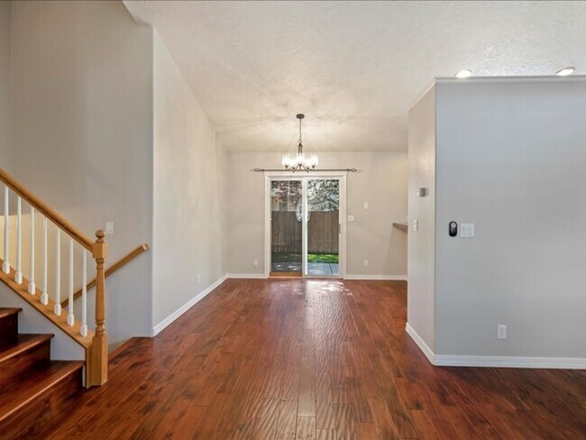 Building Photo - June Rent Free!!  Move Today!  Four Bedroom, Three Bath Home with Beautiful Backyard, Two Car Gar...