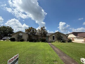Building Photo - Four Bedroom - Two Bath Property Available...