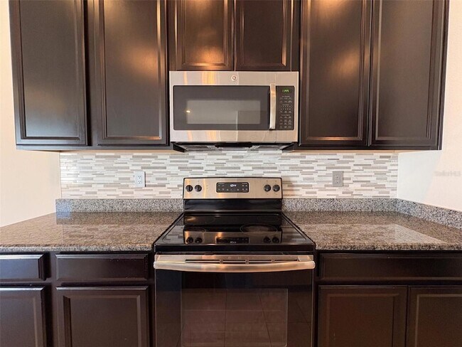 Building Photo - 7079 Woodchase Glen Dr