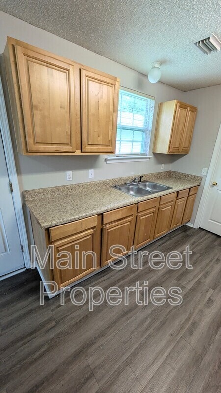 Building Photo - 8660 Figland Ave