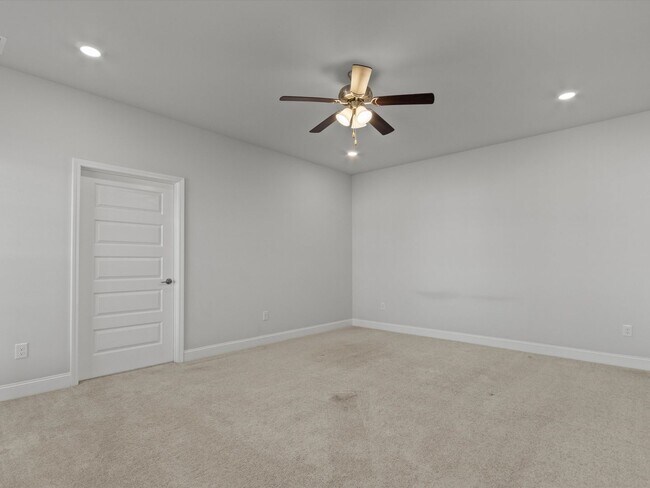 Building Photo - 3 Car Garage! Modern end-unit townhome located in the desirable Clift Farm!