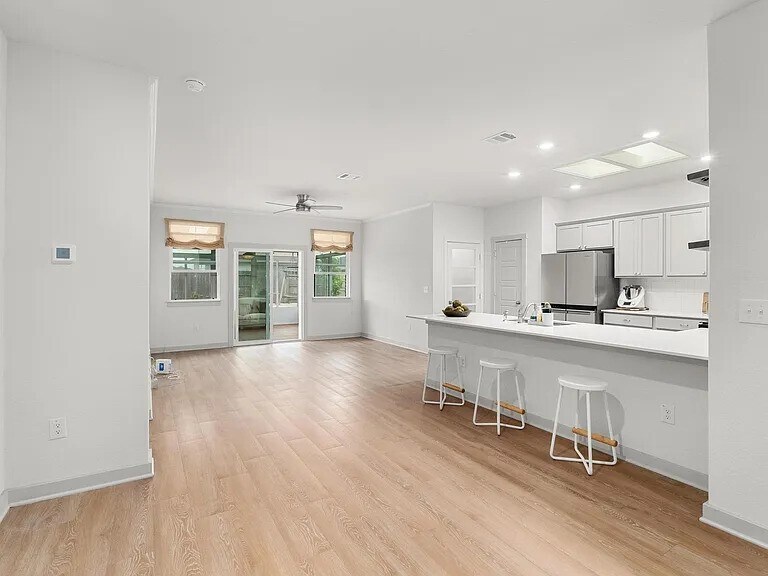 open floor to the living and dining room - 17309 Crownfield Path
