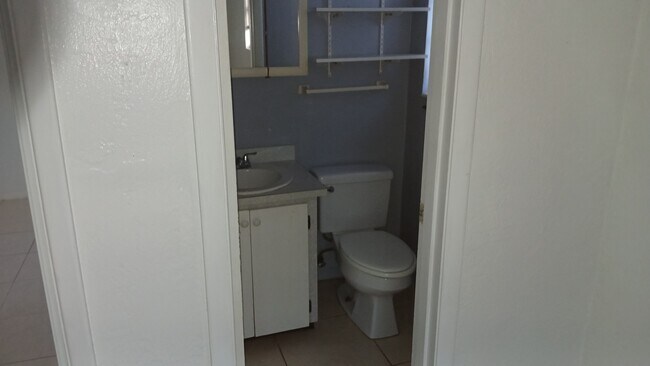 Half bath West view access 2nd bedroom - 211 Sandy Cir