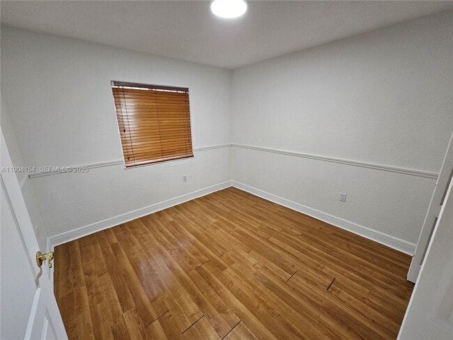 Building Photo - 10915 W Okeechobee Rd