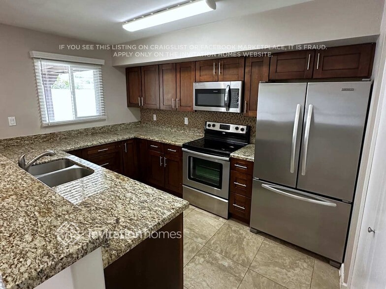 Building Photo - 6730 E Sweetwater Ave