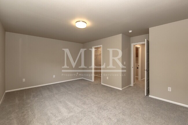 Building Photo - Elegant 4BR Covington Rental with Chef’s K...