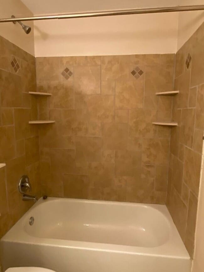 Building Photo - COMING SOON! 4Br, 2.5 baths, large kitchen, large bedrooms, fence, storage and more! N. College R...
