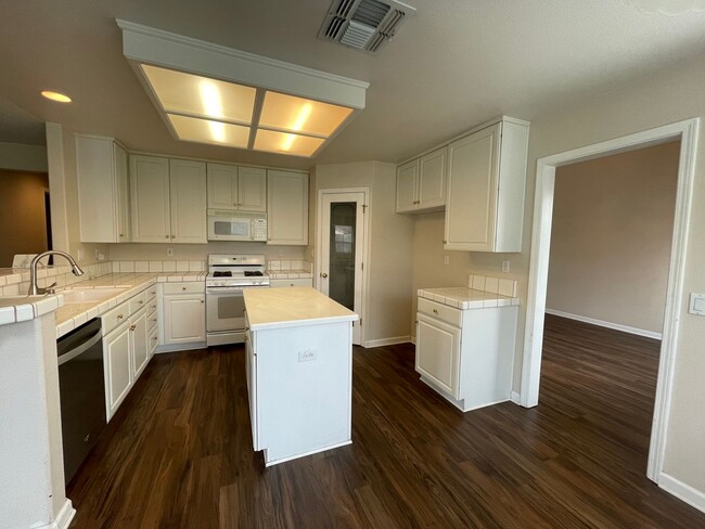 Building Photo - Upstairs Bonus Room, Attached 3-Car Garage...