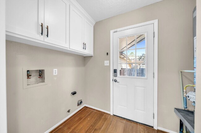 Building Photo - Welcome to this stunning 4-bedroom, 2.5-bath home on a quarter of an acre lot nestled in the high...