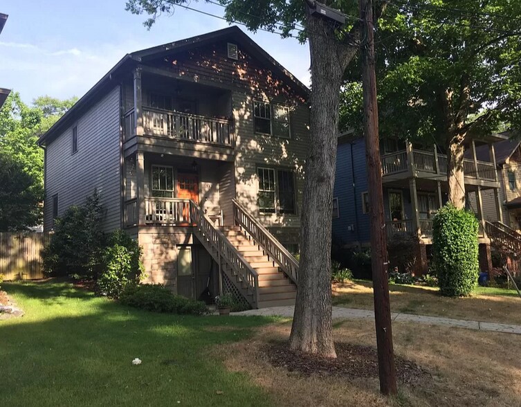 Exterior with two front porches. The rear of the home offers a full patio. - 945 Longley Ave NW