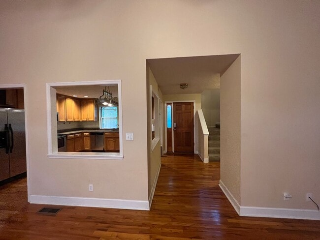 Building Photo - Massive 3 Bedroom 2.5 Bathroom Single-Family Home with Real Hardwood Floors and a Huge Two-Car Ga...