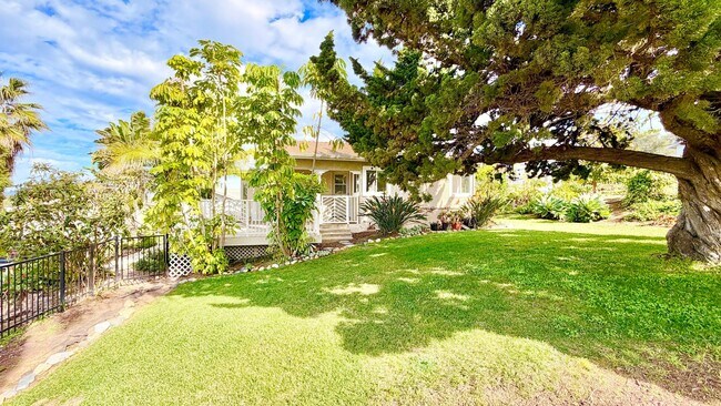 Building Photo - Beautiful Craftsman-style Home with fenced yard space, detached garage and additional parking in ...