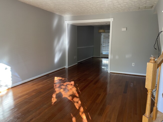 Livingroom facing kitchen - 8313 Water Lily Way