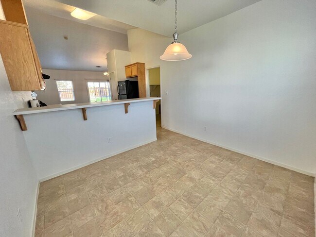 Building Photo - Large Corner Lot Home with Landscaping included!