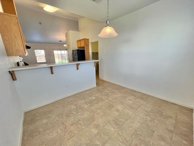 Building Photo - REDUCED!! Large Corner Lot Home with Landscaping included!