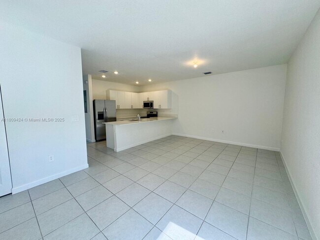 Building Photo - 26459 SW 149th Ave