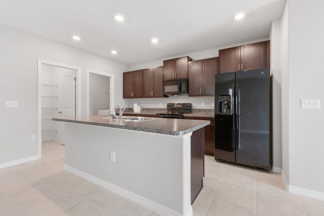 Building Photo - LIKE NEW 5 Bedroom Home for RENT in Touchstone!