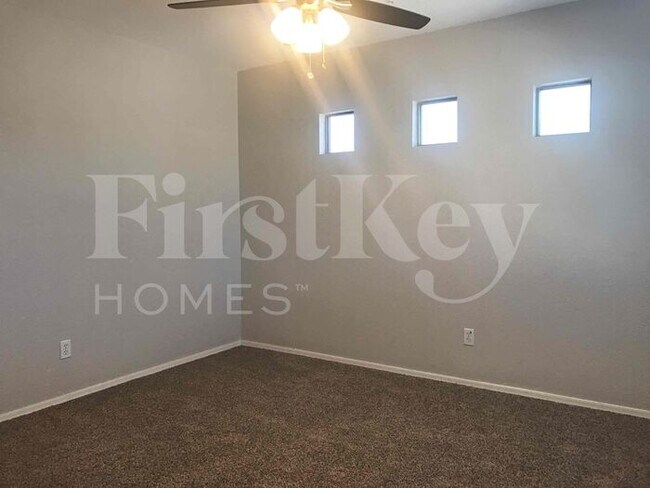 Building Photo - 8334 W Hughes Dr