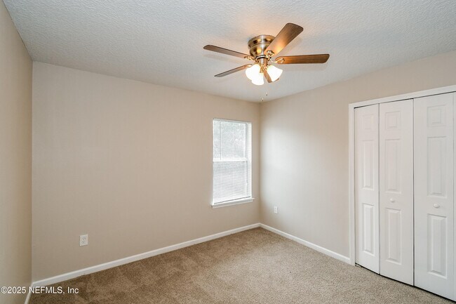 Building Photo - 9370 Jayhawk Ln