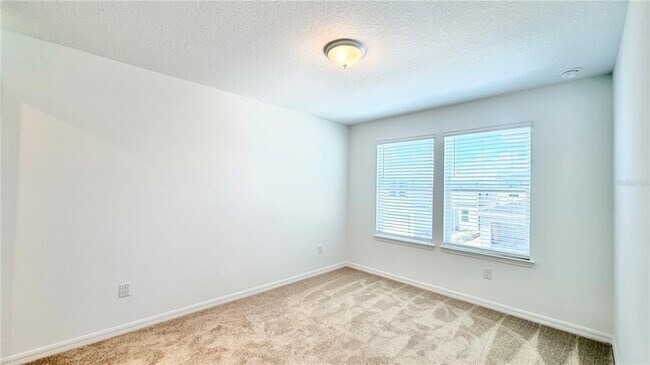 Building Photo - 5694 ENCHANTED MEADOW Aly