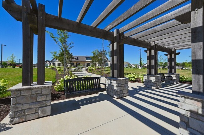 Building Photo - **BE THE LUCKY ONE TO LIVE IN THIS 2024-BUILT END-UNIT TOWNHOME IN A RESORT-STYLE COMMUNITY**
