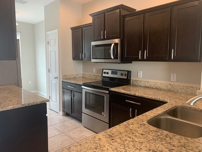Building Photo - MOVE IN SPECIAL- 4/2.5 Energy Efficient Townhome in St. Cloud